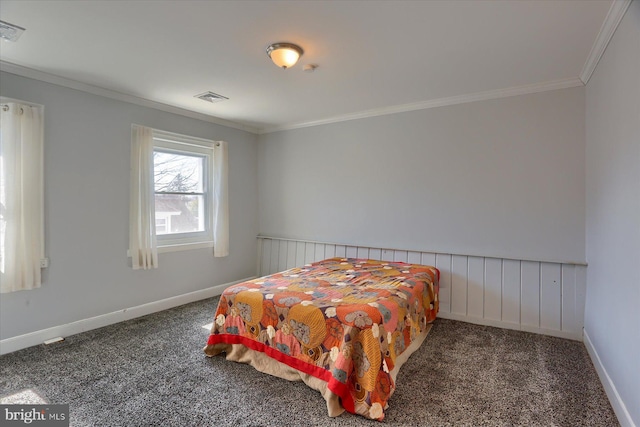 bedroom with visible vents, carpet flooring, baseboards, and ornamental molding