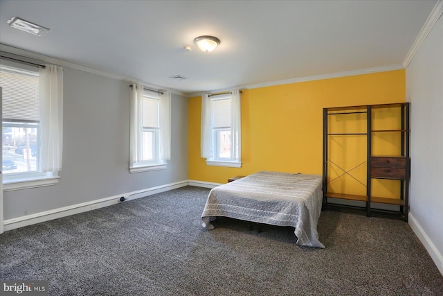 bedroom featuring visible vents, dark carpet, crown molding, and baseboards