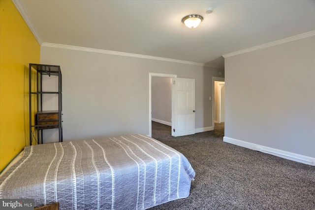 unfurnished bedroom with dark colored carpet, baseboards, and crown molding