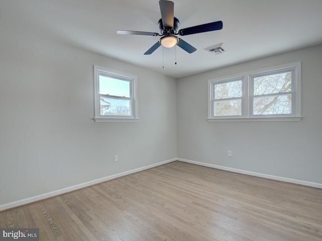 unfurnished room with ceiling fan and light hardwood / wood-style flooring