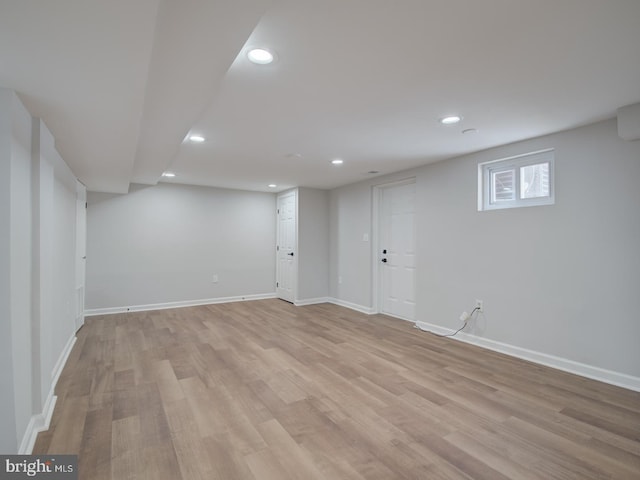 basement featuring light wood-type flooring