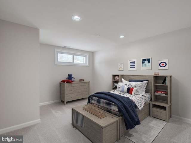 bedroom with light carpet