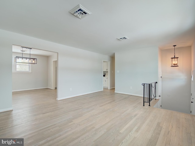 empty room with light wood-type flooring