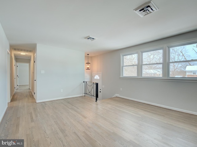 empty room featuring light hardwood / wood-style floors