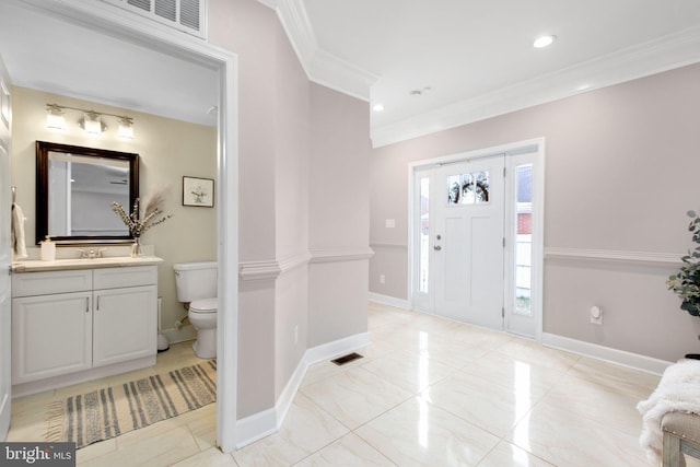 foyer entrance with crown molding