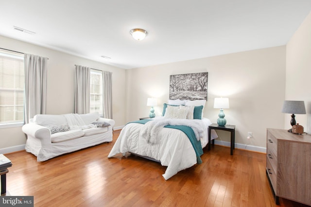 bedroom featuring hardwood / wood-style floors