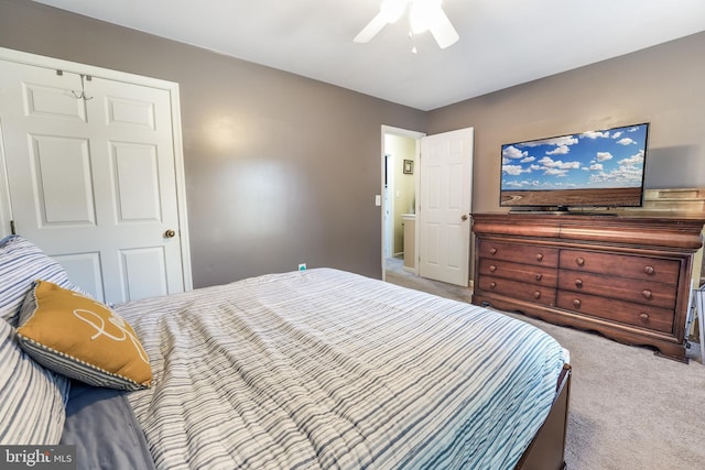 carpeted bedroom with ceiling fan