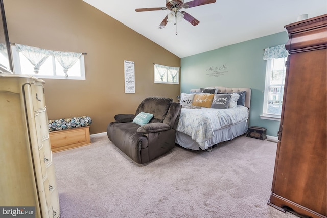 carpeted bedroom with lofted ceiling and ceiling fan