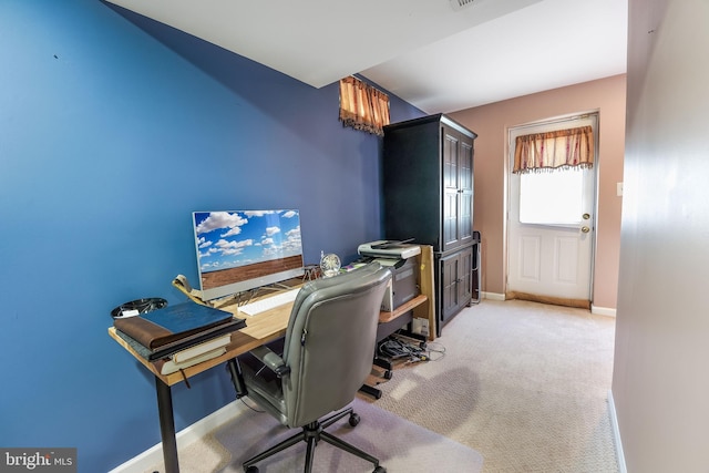 home office featuring light carpet