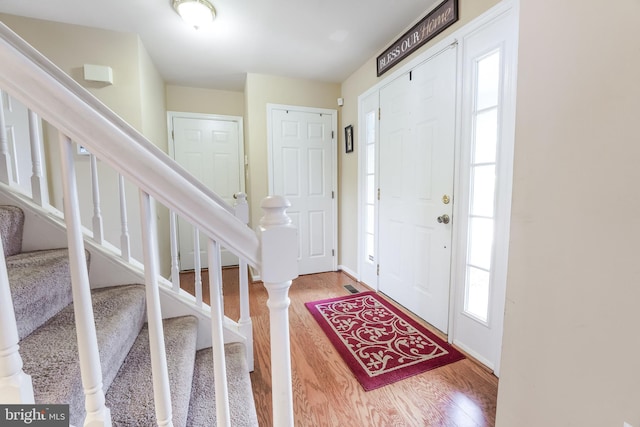 foyer with hardwood / wood-style floors