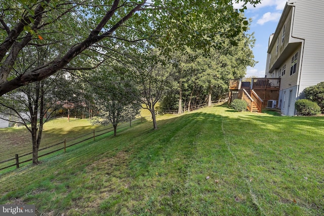 view of yard featuring a wooden deck