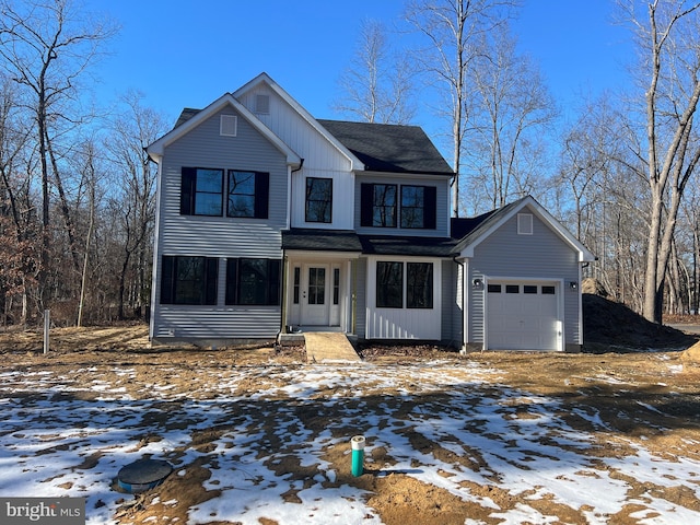 front of property with a garage