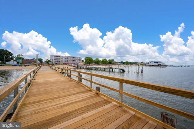 dock area featuring a water view