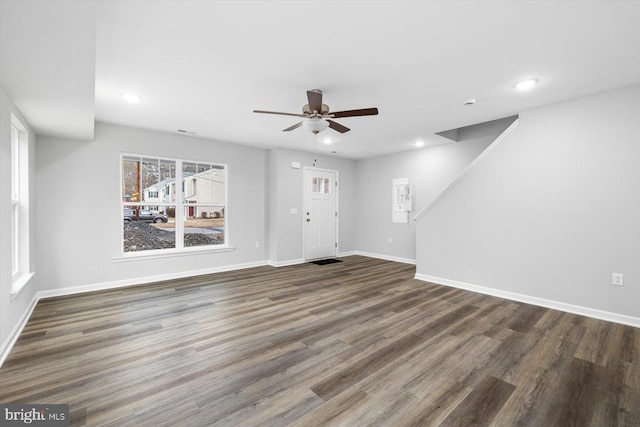 interior space featuring dark hardwood / wood-style flooring and ceiling fan