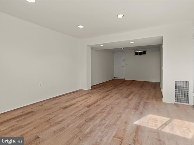 spare room with light hardwood / wood-style floors