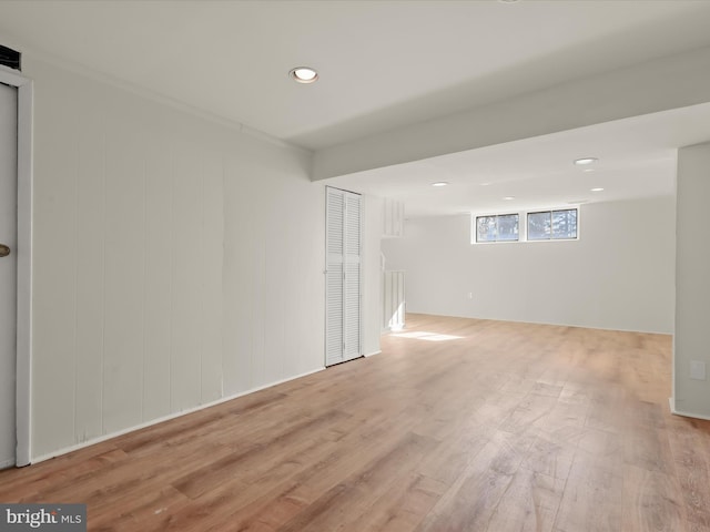 spare room featuring light wood-type flooring