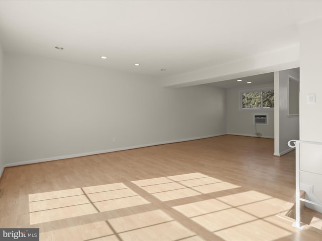 spare room with light hardwood / wood-style flooring