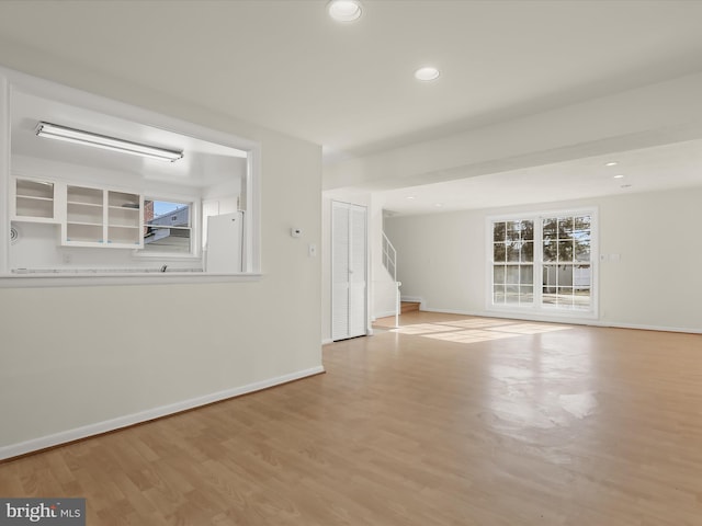 unfurnished room featuring light hardwood / wood-style floors