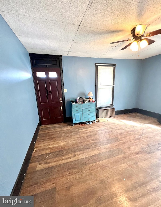 foyer featuring hardwood / wood-style flooring and ceiling fan