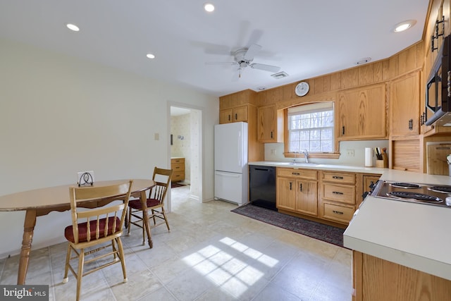 kitchen featuring visible vents, ceiling fan, light countertops, black appliances, and a sink