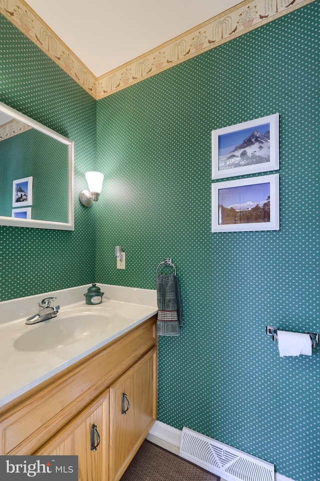 bathroom with vanity and visible vents