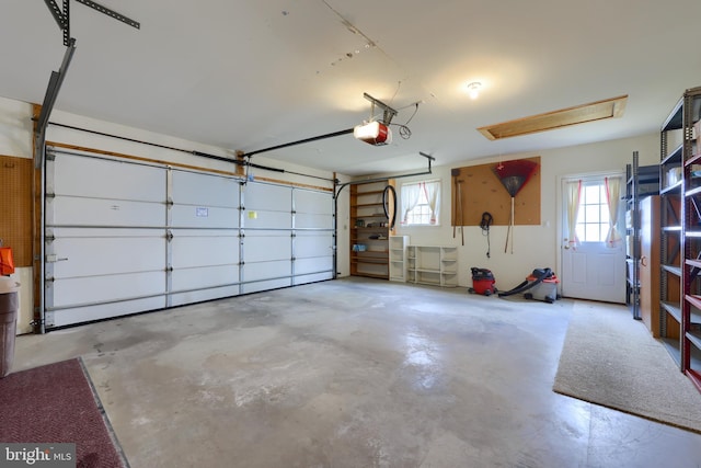 garage featuring a garage door opener