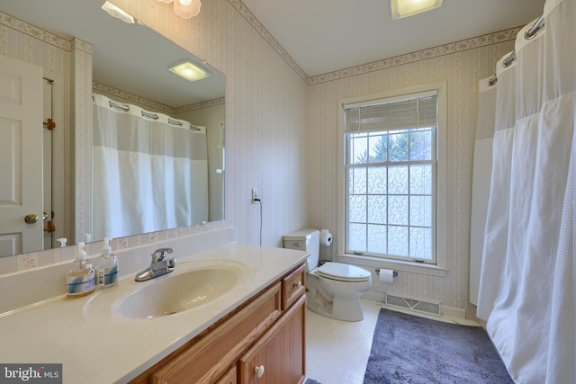 full bath with toilet, wallpapered walls, visible vents, and vanity