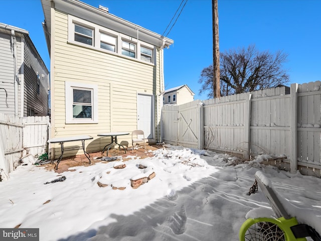 view of snow covered property