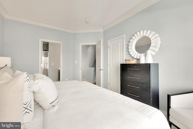 bedroom featuring crown molding