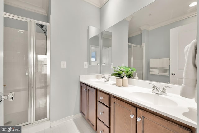 bathroom with an enclosed shower, crown molding, and vanity