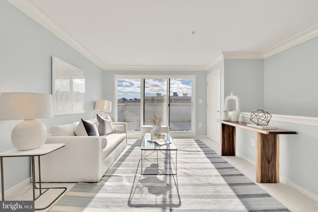 living room featuring ornamental molding and light carpet