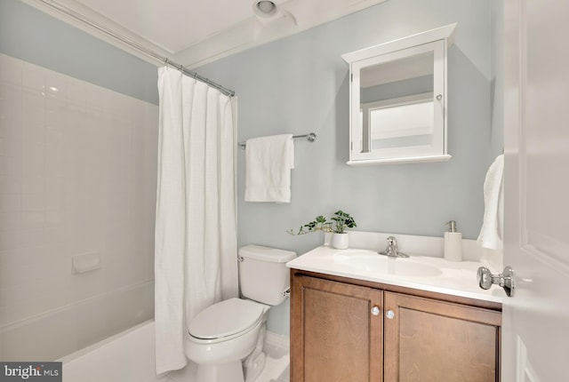 full bathroom with ornamental molding, toilet, vanity, and shower / bath combo