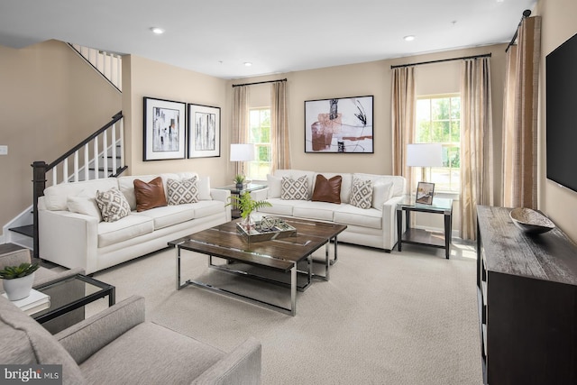 living room featuring light colored carpet