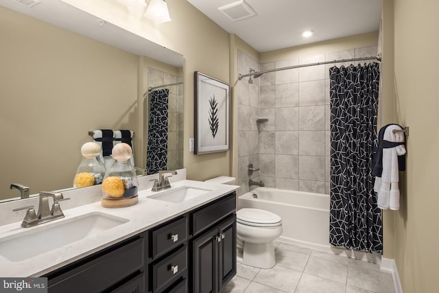 full bathroom with vanity, tile patterned floors, toilet, and shower / bathtub combination with curtain