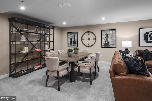 dining room featuring carpet