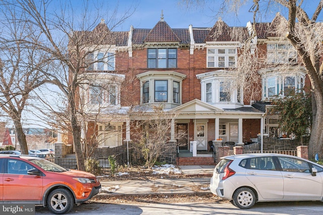 view of property featuring a porch