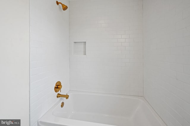 full bath featuring shower / bathtub combination