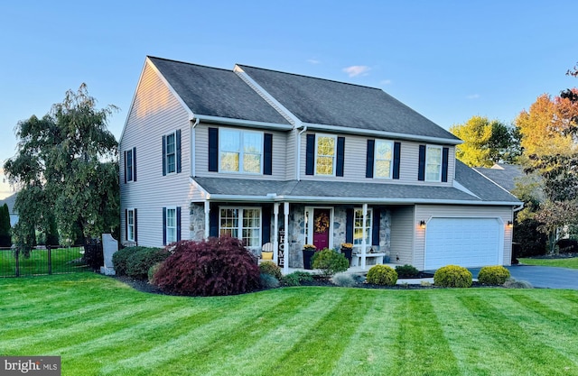 view of front facade with a porch and a front lawn