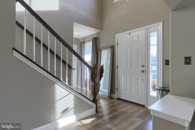 foyer with hardwood / wood-style floors