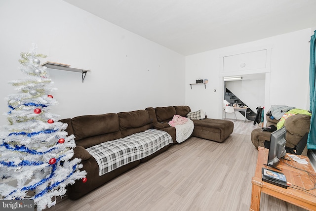 living room with light hardwood / wood-style floors