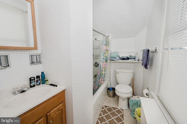 full bathroom with shower / tub combo, vanity, tile patterned floors, and toilet