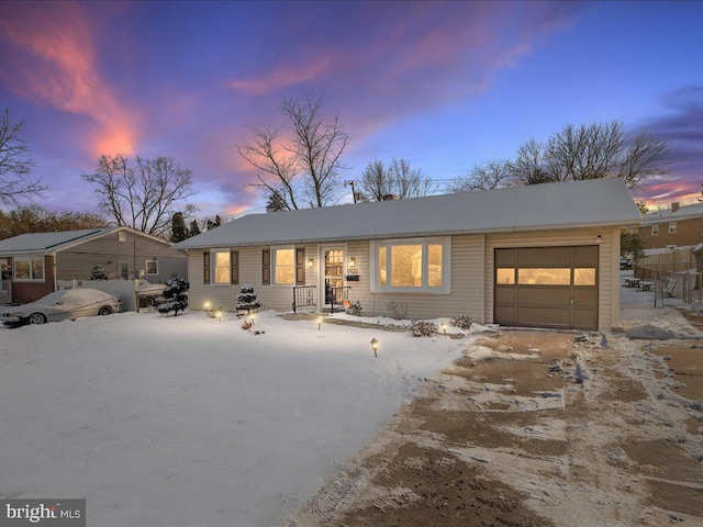 view of front of home featuring a garage