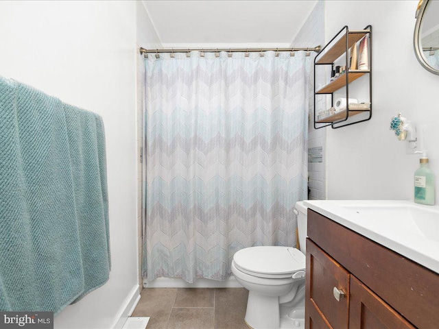 bathroom with toilet, vanity, and a shower with shower curtain