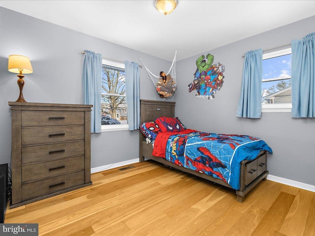 bedroom featuring hardwood / wood-style floors