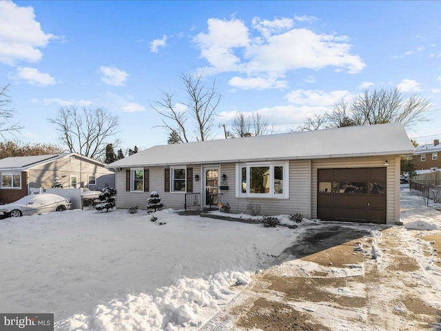 single story home with a garage