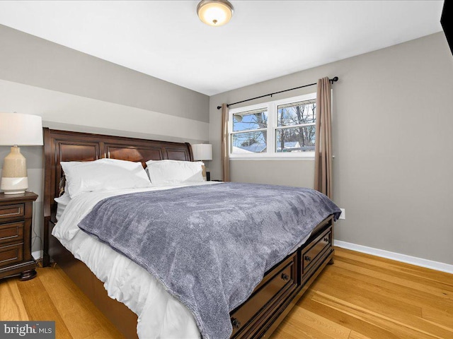 bedroom with light wood-type flooring