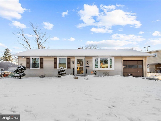 single story home with a garage