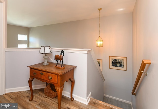 staircase featuring hardwood / wood-style floors