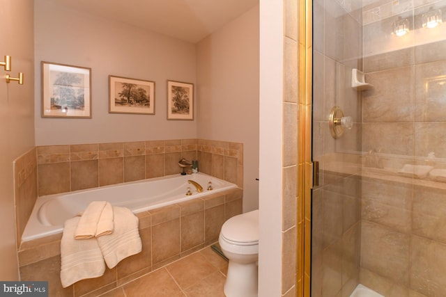 bathroom featuring toilet, independent shower and bath, and tile patterned floors