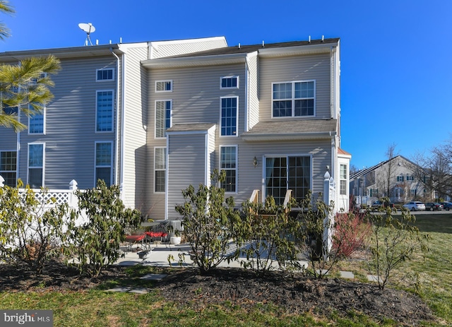 back of house featuring a patio area